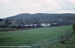 13.05.1986: 211 065 mit Unkrautspritzzug zwischen Waldbach und Sötern